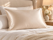 Smoozely silk pillowcase in a bedroom setting, colour champagne pearl