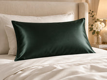 Smoozely silk pillowcase in a bedroom setting, colour deep forest