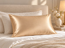 Smoozely silk pillowcase in a bedroom setting, colour golden sand