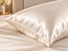 Smoozely silk pillowcase angled view in ivory cloud