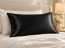 Smoozely silk pillowcase in a bedroom setting, colour midnight black