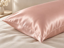 Smoozely silk pillowcase angled view in soft blush